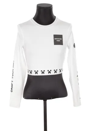 Top blanc Lacoste blanc. Matière principale polyester. Taille 34.
